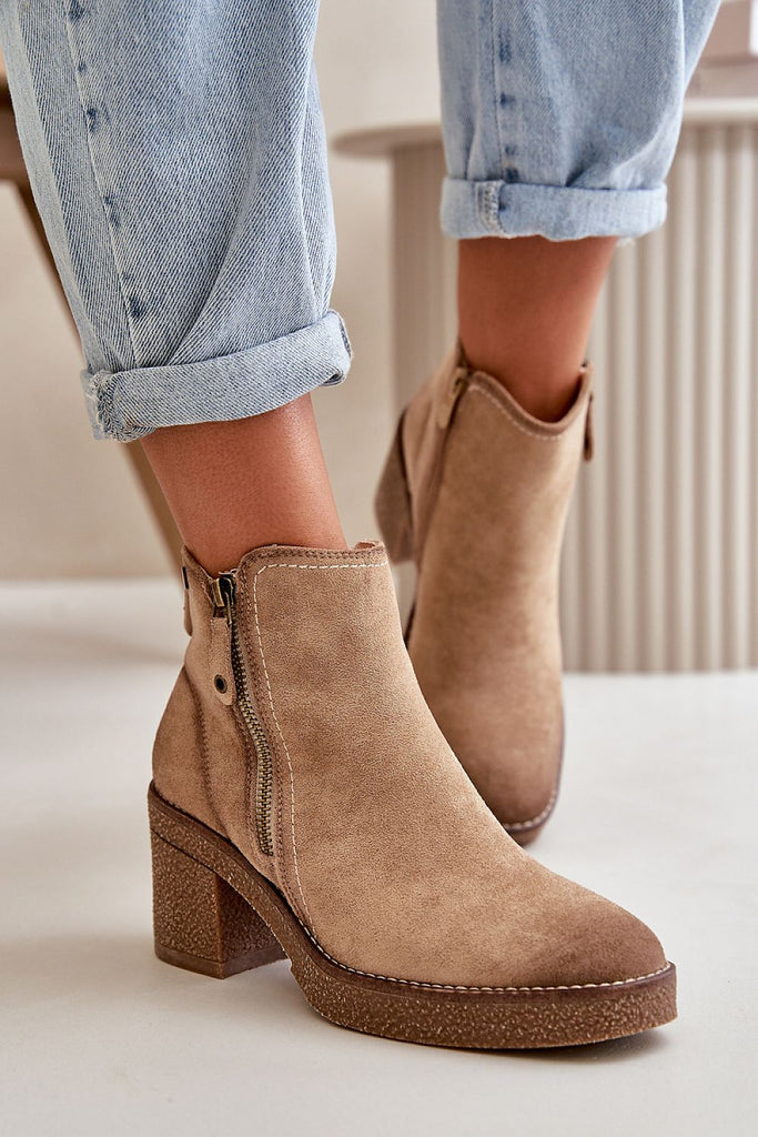 Heel boots Step in style